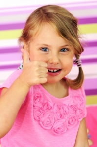 Little girl with thumbs up